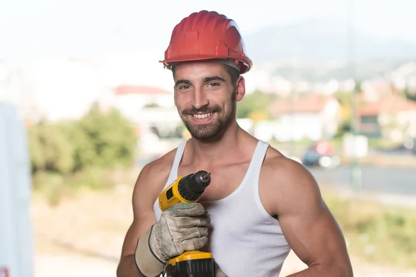 Portrait Of A Worker With Drill — Stock Photo, Image