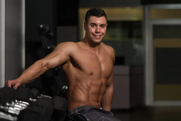 Attractive Young Man Resting In Gym Afther Exercise — Stock Photo, Image