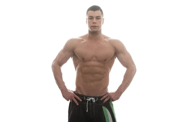 Bodybuilder met zes Pack op witte achtergrond — Stockfoto