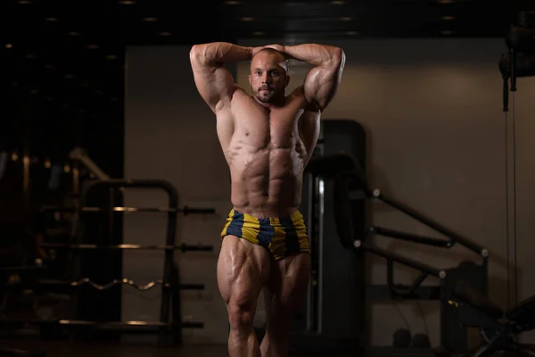 Muscled Male Model Posing In The Gym — Stock Photo, Image