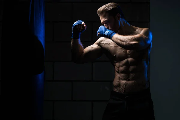 Boxer With Punch Bag In Action — Stock Photo, Image