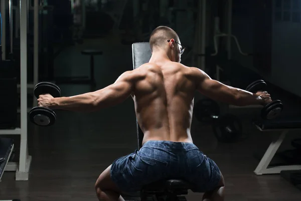 Back Exercise With Dumbbell In A Gym — Stock Photo, Image