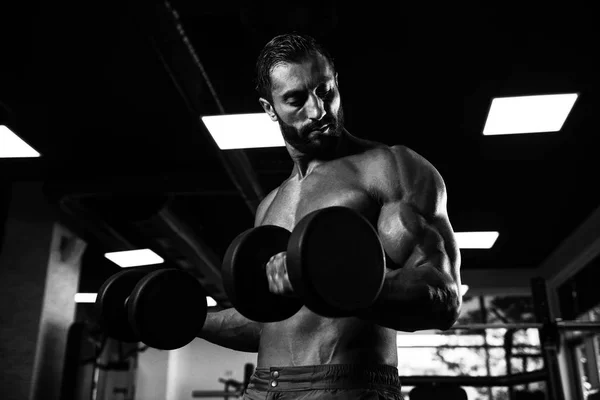 Young Man With Dumbbells Exercising Biceps — Stock Photo, Image