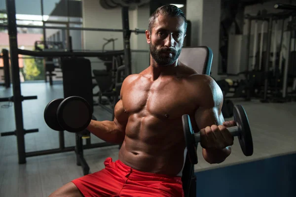 Young Man With Dumbbells Exercising Biceps — Stock Photo, Image