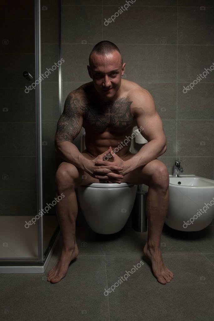 Man Sitting On Toilet Diarrhea — Stock Photo © ibrak #135397694
