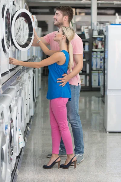 Couple At Groceries Store Buy Washing Machine — Stock Photo, Image