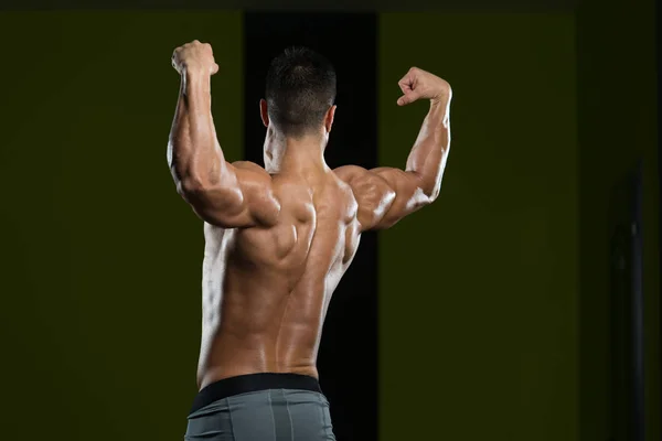 Physically Man Showing His Well Trained Back — Stock Photo, Image