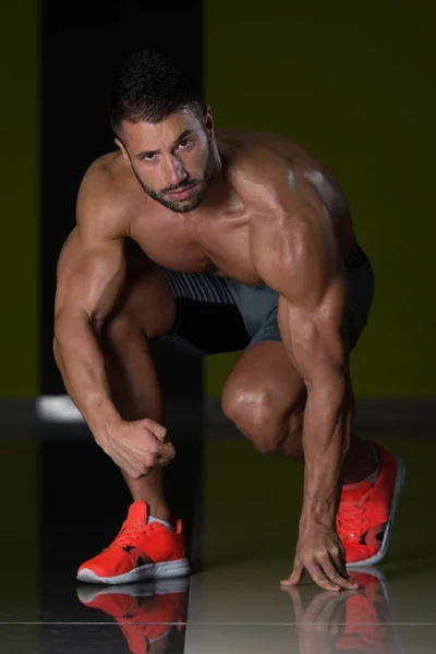 Strong Muscular Men Kneeling On The Floor — Stock Photo, Image