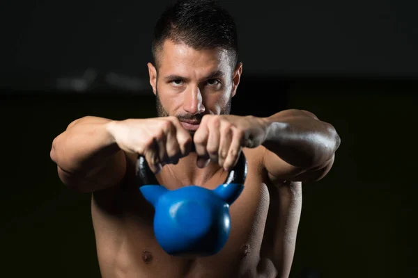 Muscular Man Exercising With Kettle-bell — Stock Photo, Image