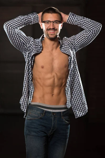 Man Showing Abdominal Muscle In Jeans — Stock Photo, Image