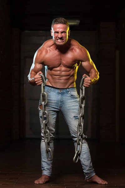 Young Man Workout Biceps With Chains — Stock Photo, Image