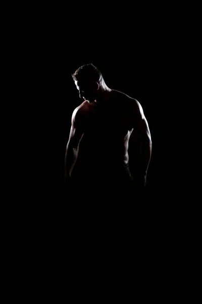 Siluet spieren van het buigen van de gespierde Bodybuilder — Stockfoto