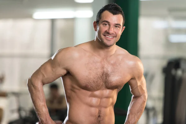 Hairy Man Flexing Muscles — Stock Photo, Image