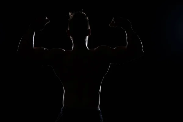 Silueta hombre en negro fondo — Foto de Stock