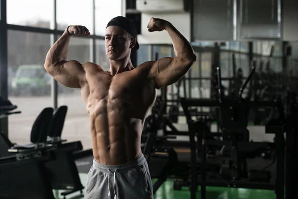 Dupla bicepsz póz után gyakorlatok testépítő-Fitness modell — Stock Fotó