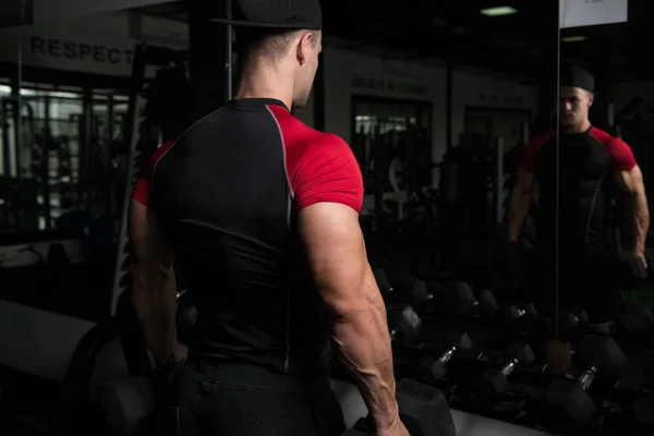 Muscular Man Exercising Biceps With Dumbbell — Stock Photo, Image