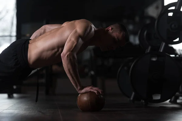 Pushup On Ball With One Hand — Stock Photo, Image