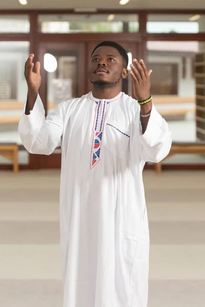 African Muslim Man Is Praying In The Mosque