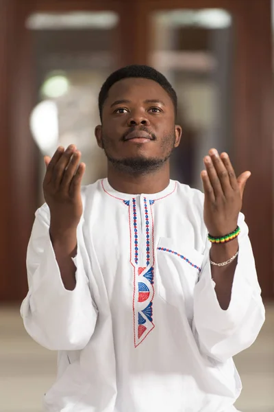 African Muslim Praying In Mosque