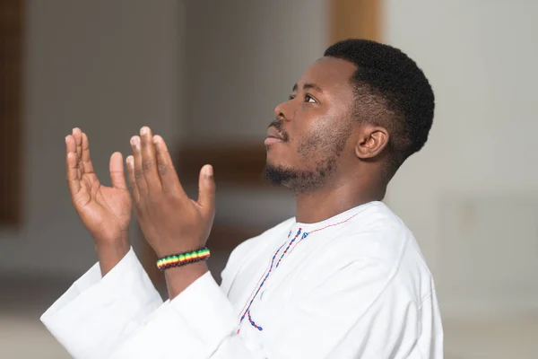 Young African Muslim Guy Praying