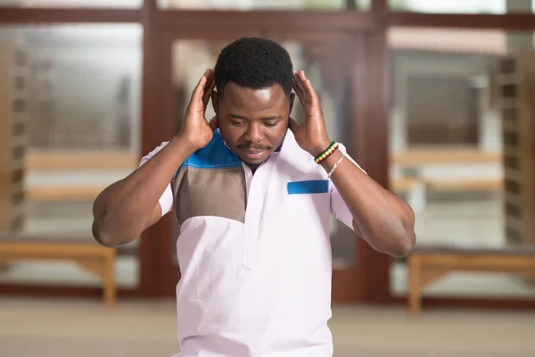 African Muslim Praying In Mosque