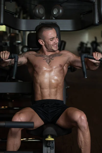 Chest Exercise On Machine In A Gym — Stock Photo, Image