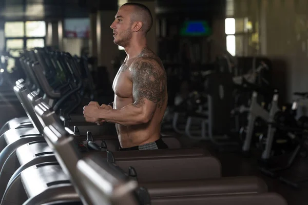 stock image Man Exercising On A Treadmill