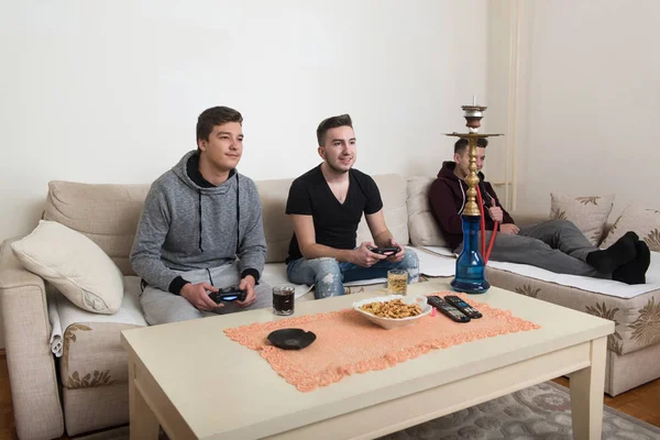 Three Friends Playing Video Games — Stock Photo, Image