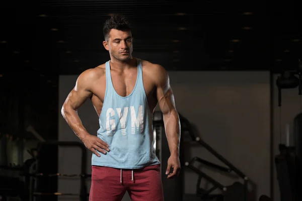 Man In Undershirt Flexing Muscles — Stock Photo, Image