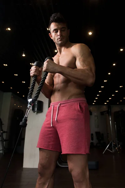 Man Doing Heavy Exercise For Biceps With Cable — Stock Photo, Image