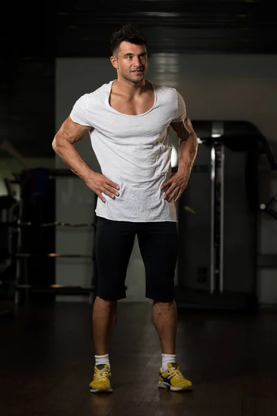 Strong Man in White T-shirt Background Gym — Stock Photo, Image