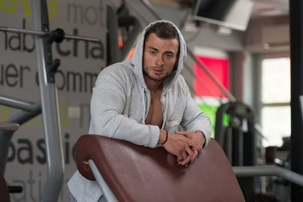 Attractive Young Man Resting In Gym Afther Exercise — Stock Photo, Image