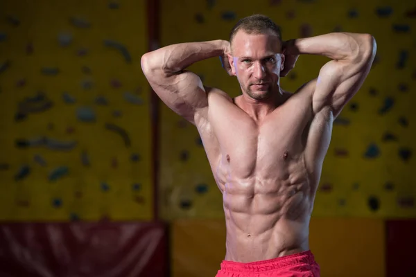 Muscular Bodybuilder Showing His Front Abdominal Abs — Stock Photo, Image