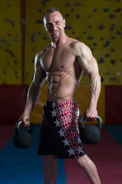 Man Exercising With Kettle Bell — Stock Photo, Image