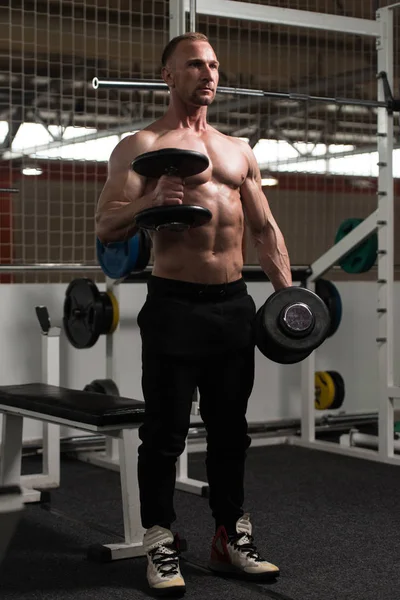 Man With Dumbbells Exercising Biceps — Stock Photo, Image