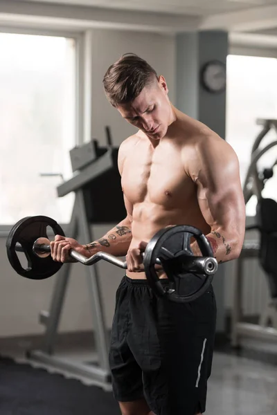 Biceps Exercise With Barbell — Stock Photo, Image