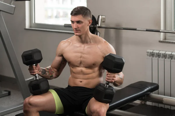 Man Preparing To Doing Shoulders Exercise With Dumbbells — Stock Photo, Image