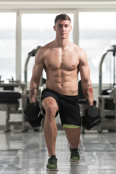 Athlete Doing Exercise For Legs With Dumbbells — Stock Photo, Image