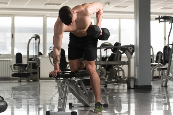 Back Exercise With Dumbbells In A Gym — Stock Photo, Image