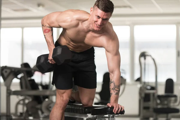 Man With Dumbbells Exercising Back — Stock Photo, Image