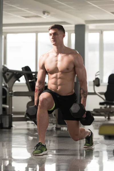 Athlete Doing Exercise For Legs With Dumbbells — Stock Photo, Image