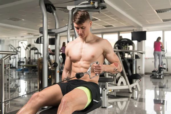 Young Man Exercising Back In The Gym — Stock Photo, Image