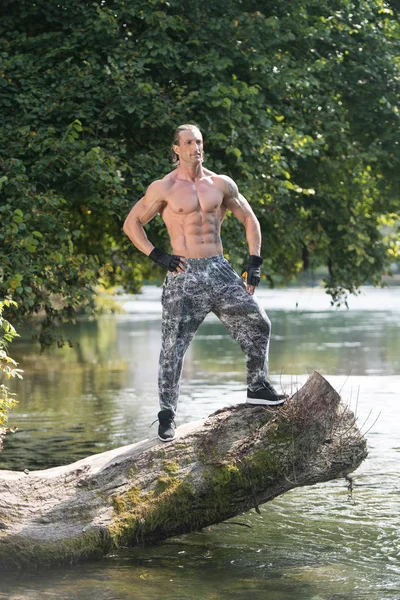 Man Outdoors In Nature Showing His Body — Stock Photo, Image