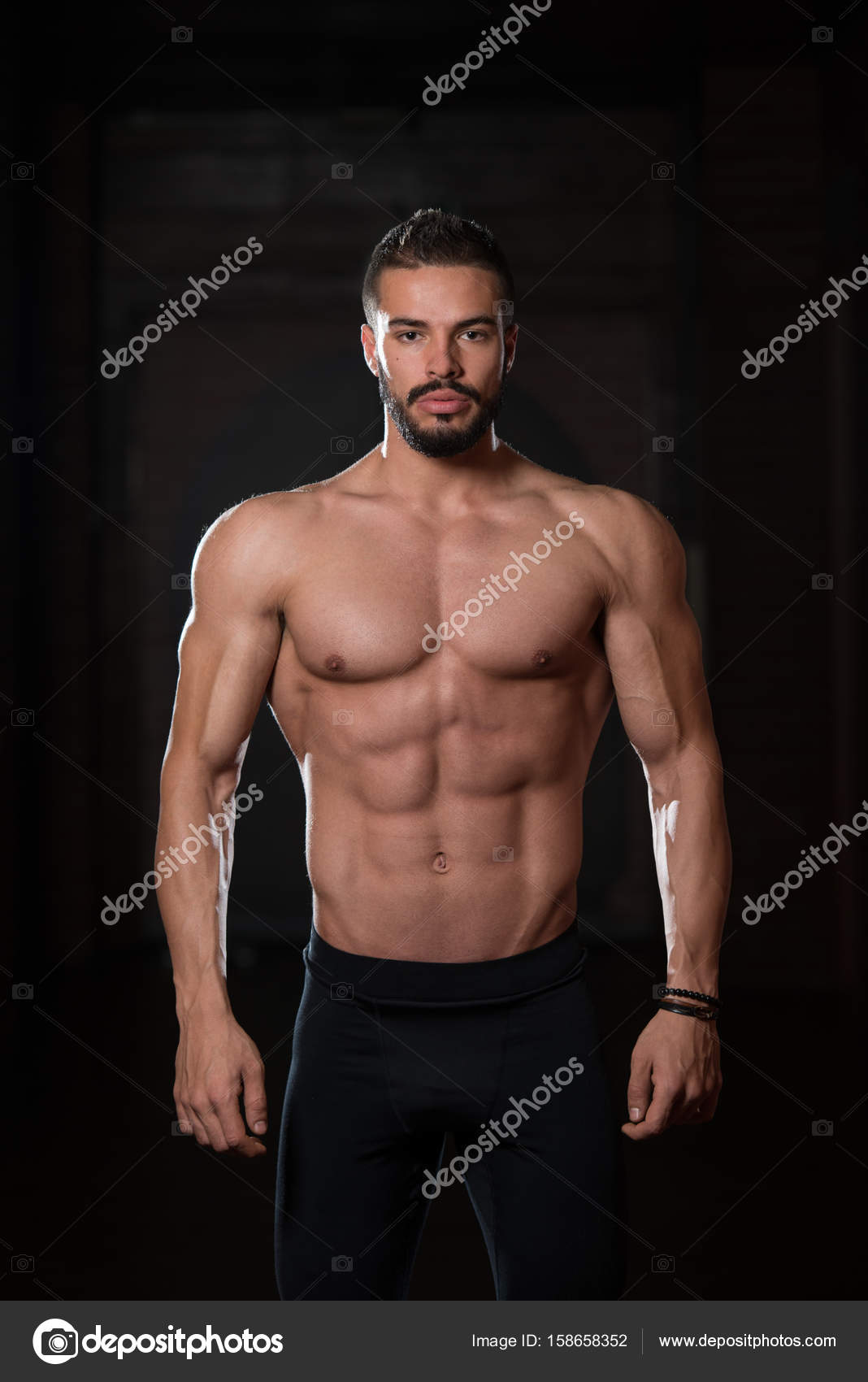 Handsome Muscular Model Handsome Muscular Model Flexing Muscles In Stock