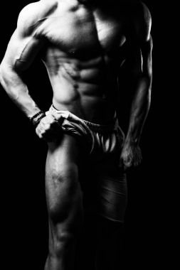 Bacak kasları siyah arka plan üzerine esneme kas modeli