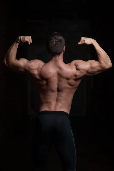 Model Posing Biceps After Exercises — Stock Photo, Image