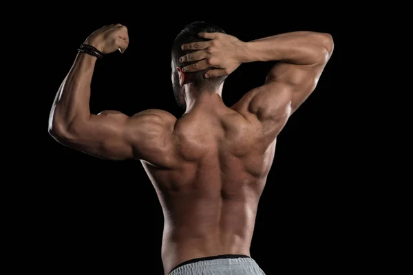 Músculos de flexión modelo muscular sobre fondo negro — Foto de Stock