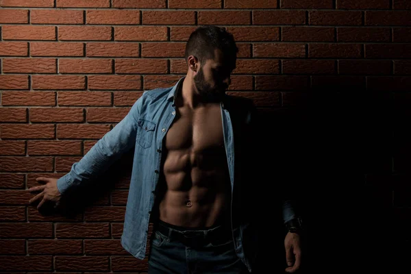 Model Flexing Muscles in Plaid Shirt — Stock Photo, Image