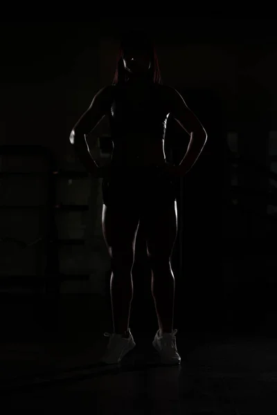 Silhouette Fitness Mujer Flexing Músculos — Foto de Stock