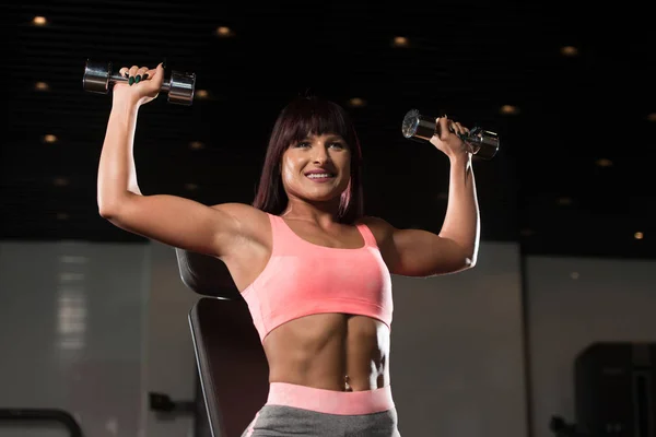 Woman Doing Shoulders Exercise With Dumbbells — Stock Photo, Image
